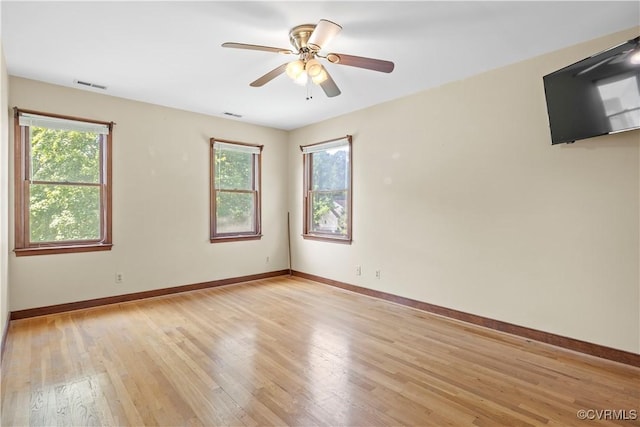 11906 Exbury Ter, Midlothian, VA 23114 - empty room featuring light wood finished floors, plenty of natural light, and ceiling fan