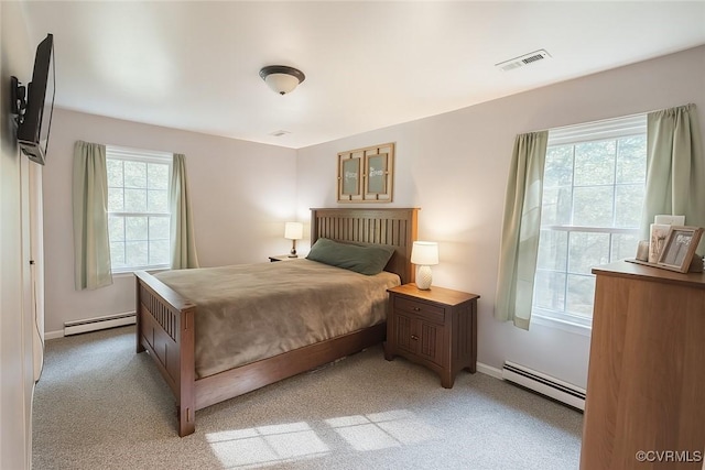3601 Haupts Ln, Charles City, VA 23231 - bedroom with a baseboard heating unit and light carpet