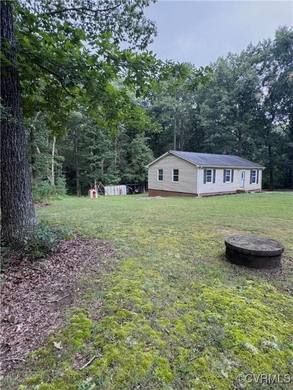 3601 Haupts Ln, Charles City, VA 23231 - view of grassy yard with a wooded view
