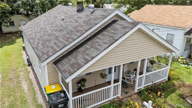 2210 W City Point Rd, Hopewell, VA 23860 - view of front of property featuring a shingled roof and a porch