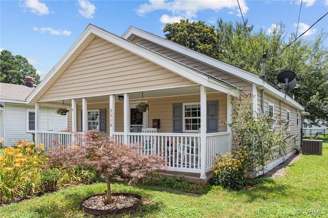 2210 W City Point Rd, Hopewell, VA 23860 - bungalow-style home featuring a porch and a front lawn