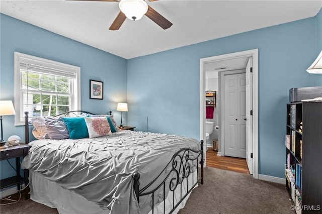 2210 W City Point Rd, Hopewell, VA 23860 - carpeted bedroom featuring baseboards and ceiling fan