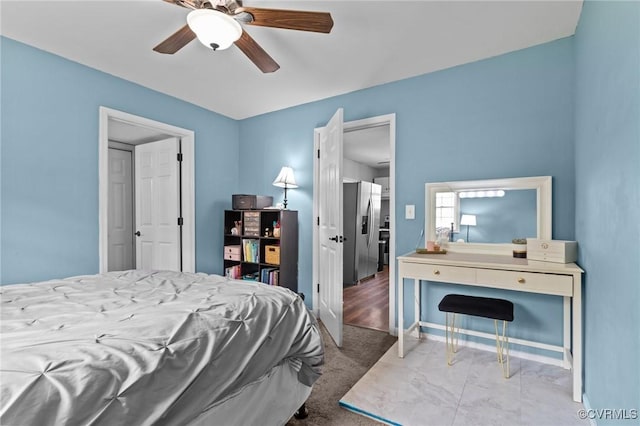2210 W City Point Rd, Hopewell, VA 23860 - bedroom with stainless steel fridge with ice dispenser, a ceiling fan, and a desk
