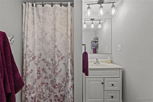 2210 W City Point Rd, Hopewell, VA 23860 - bathroom with vanity and a shower with shower curtain