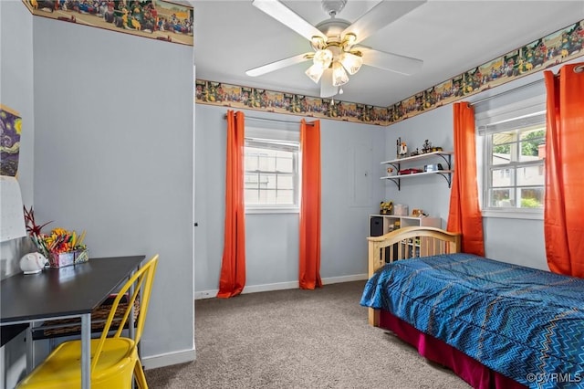2210 W City Point Rd, Hopewell, VA 23860 - carpeted bedroom with baseboards and ceiling fan