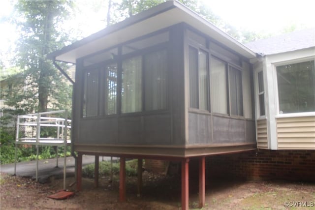7401 Velvet Antler Dr, Midlothian, VA 23112 - view of side of property featuring a sunroom and brick siding