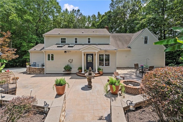 18030 W County Line Rd, Midlothian, VA 23112 - back of house with an outdoor fire pit, a patio, and roof with shingles