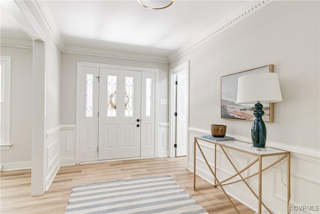 2613 Teaberry Dr, North Chesterfield, VA 23236 - foyer featuring light wood-type flooring, a decorative wall, and wainscoting
