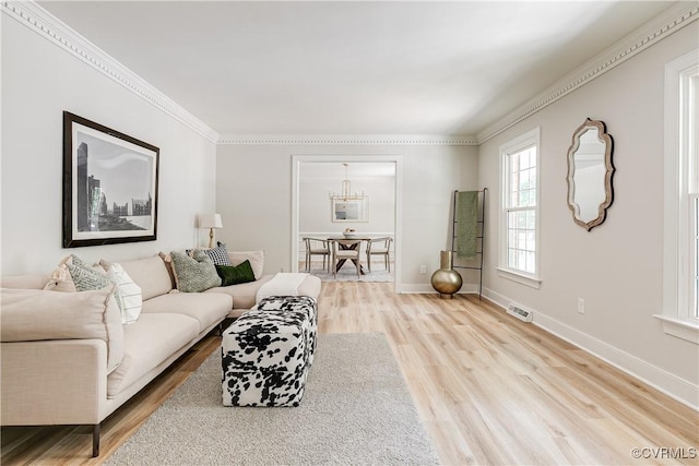 2613 Teaberry Dr, North Chesterfield, VA 23236 - living area featuring wood finished floors and ornamental molding