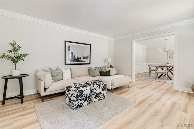 2613 Teaberry Dr, North Chesterfield, VA 23236 - living area featuring crown molding, light wood finished floors, and a chandelier