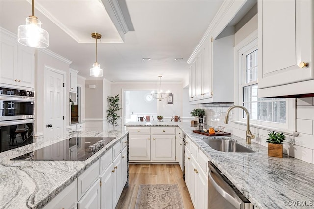 2613 Teaberry Dr, North Chesterfield, VA 23236 - kitchen with light wood finished floors, stainless steel appliances, white cabinets, decorative backsplash, and crown molding