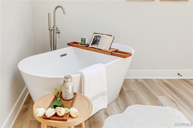 2613 Teaberry Dr, North Chesterfield, VA 23236 - bathroom view of a freestanding tub and wood finished floors