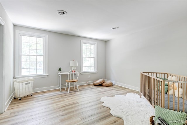 2613 Teaberry Dr, North Chesterfield, VA 23236 - bedroom featuring multiple windows and wood finished floors