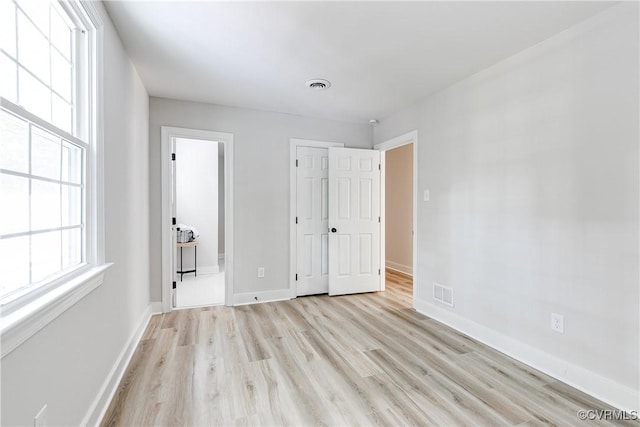 2613 Teaberry Dr, North Chesterfield, VA 23236 - unfurnished bedroom featuring light wood-style floors and baseboards