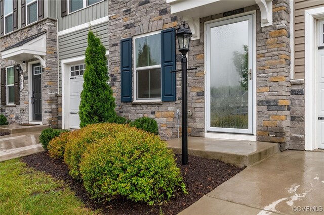 5845 Austin Woods Dr, North Chesterfield, VA 23234 - doorway to property featuring stone siding and board and batten siding