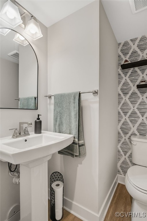 5845 Austin Woods Dr, North Chesterfield, VA 23234 - bathroom with toilet and wood finished floors