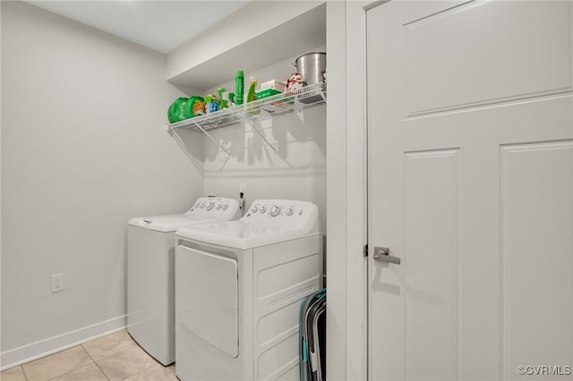 5845 Austin Woods Dr, North Chesterfield, VA 23234 - washroom featuring washing machine and clothes dryer and light tile patterned flooring