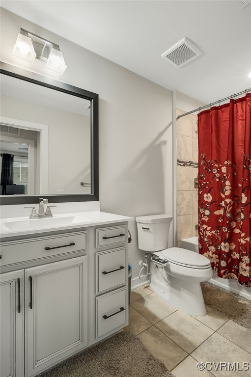 5845 Austin Woods Dr, North Chesterfield, VA 23234 - full bathroom featuring tile patterned flooring, vanity, and shower / bath combo