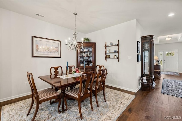 6267 Courage Trl, Chesterfield, VA 23832 - dining area with dark wood-style flooring and a chandelier