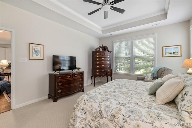 6267 Courage Trl, Chesterfield, VA 23832 - bedroom with crown molding, a tray ceiling, light carpet, and a ceiling fan