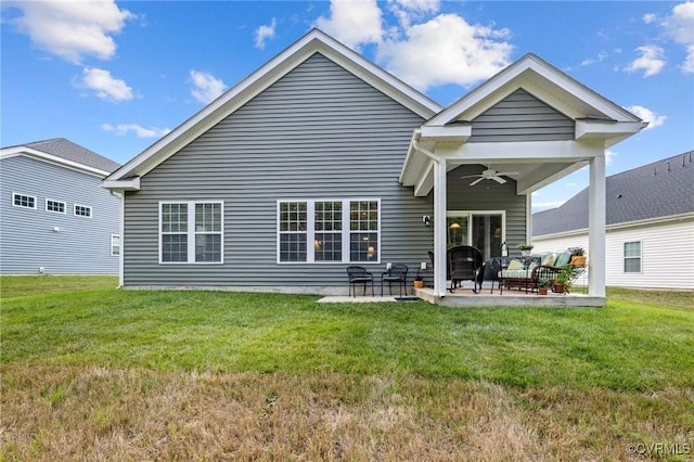 6267 Courage Trl, Chesterfield, VA 23832 - rear view of house featuring ceiling fan, a lawn, a patio, and an outdoor living space