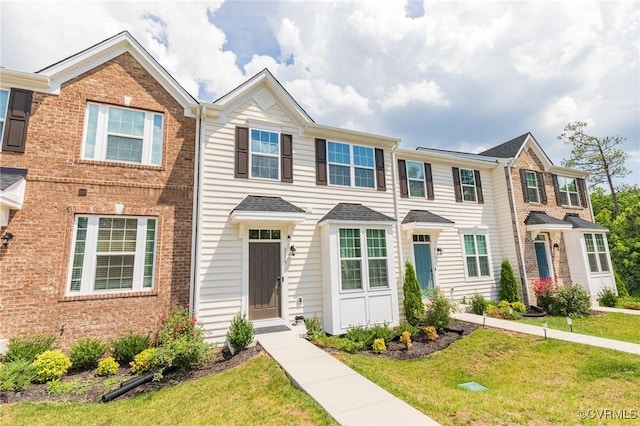 3119 Perdue Springs Dr, Chester, VA 23831 - colonial-style house with a front yard and brick siding