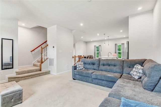 3119 Perdue Springs Dr, Chester, VA 23831 - living room with carpet floors, stairway, and recessed lighting