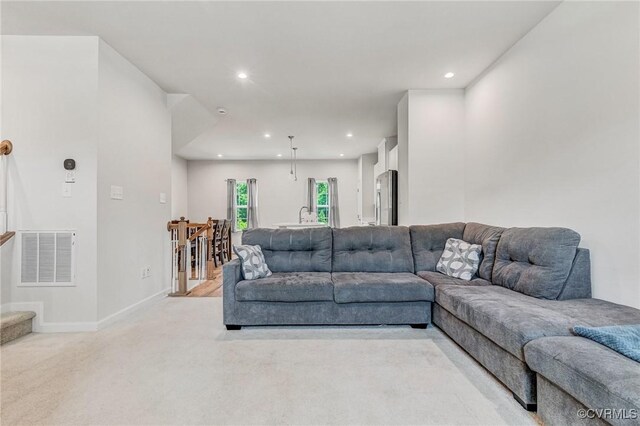 3119 Perdue Springs Dr, Chester, VA 23831 - living room with light colored carpet and recessed lighting