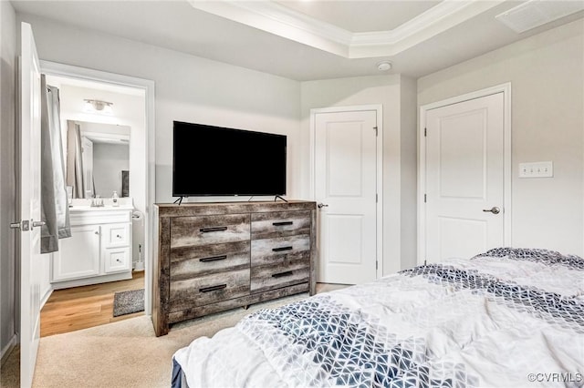 3119 Perdue Springs Dr, Chester, VA 23831 - bedroom featuring crown molding, a tray ceiling, light carpet, and ensuite bath