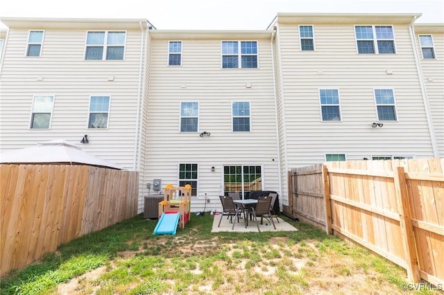 3119 Perdue Springs Dr, Chester, VA 23831 - back of house with a patio and a fenced backyard
