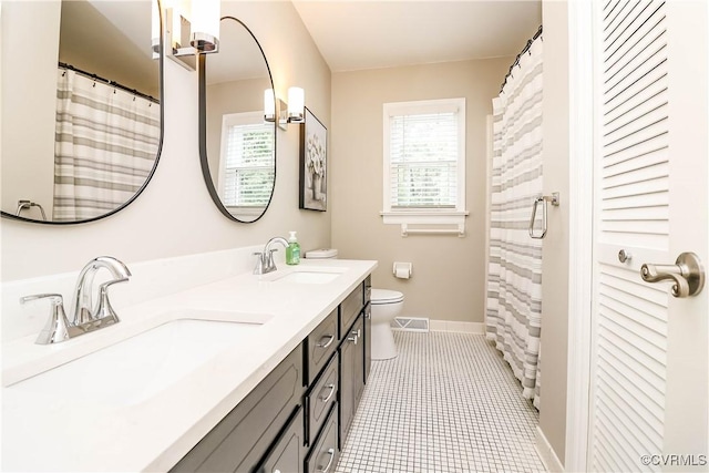 5618 Buxton Ct, Chester, VA 23831 - bathroom featuring double vanity and tile patterned flooring