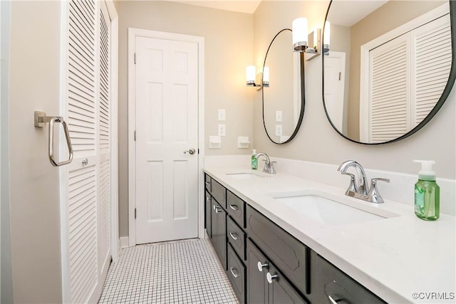 5618 Buxton Ct, Chester, VA 23831 - bathroom with a closet, double vanity, and tile patterned flooring