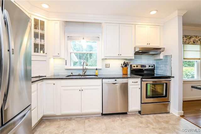 5618 Buxton Ct, Chester, VA 23831 - kitchen with stainless steel appliances, under cabinet range hood, dark stone counters, plenty of natural light, and crown molding