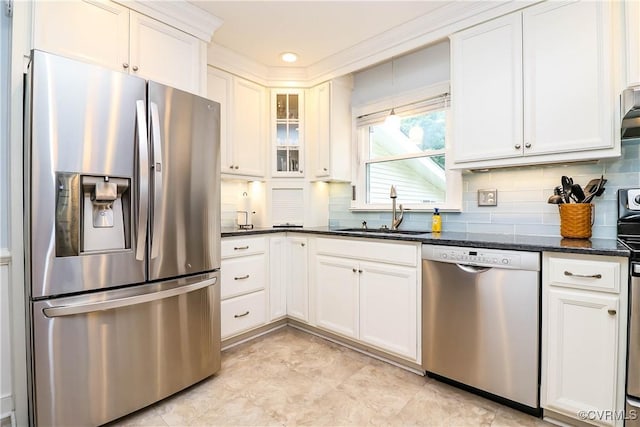 5618 Buxton Ct, Chester, VA 23831 - kitchen with stainless steel appliances, backsplash, glass insert cabinets, dark stone counters, and white cabinetry