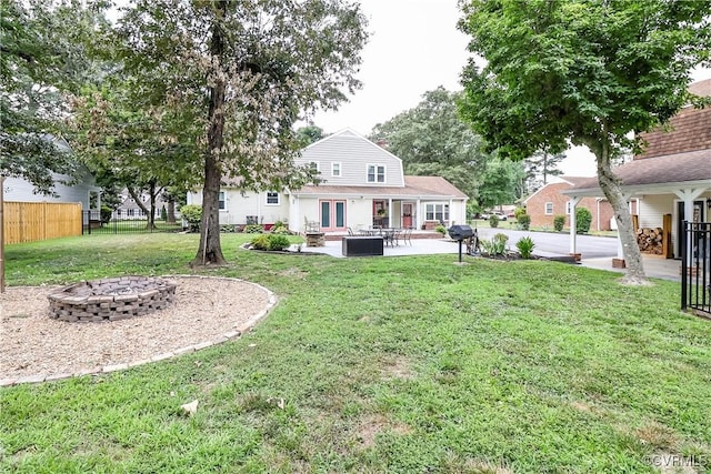5618 Buxton Ct, Chester, VA 23831 - rear view of house featuring an outdoor fire pit, a patio, and french doors