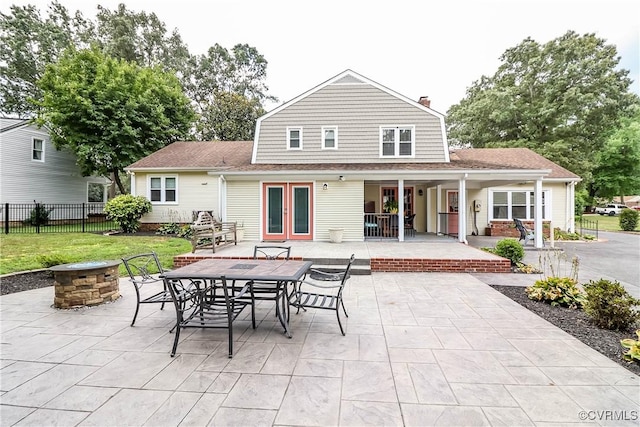5618 Buxton Ct, Chester, VA 23831 - rear view of property with an outdoor fire pit, a patio area, a chimney, and french doors