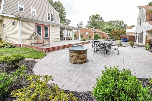 5618 Buxton Ct, Chester, VA 23831 - view of patio with an outdoor fire pit