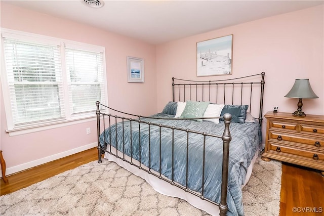 5618 Buxton Ct, Chester, VA 23831 - bedroom with wood finished floors and baseboards