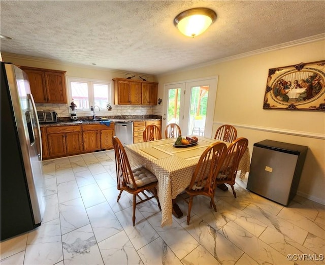 1932 Howardsville Tpke, Stuarts Draft, VA 24477 - dining room with light marble finish floors, ornamental molding, and a textured ceiling