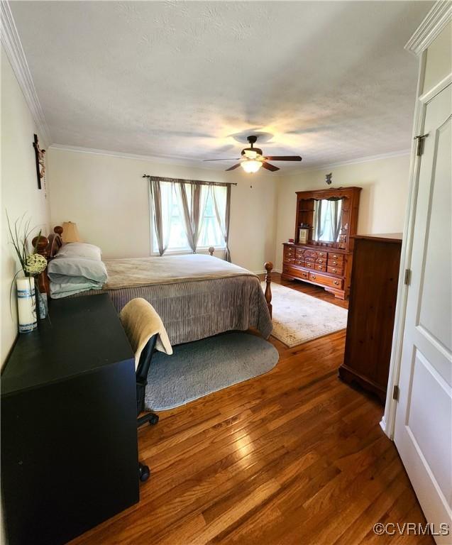 1932 Howardsville Tpke, Stuarts Draft, VA 24477 - bedroom with wood finished floors, ornamental molding, and a ceiling fan