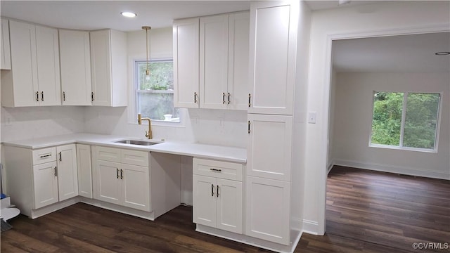 8057 Hermitage Rd, Henrico, VA 23228 - kitchen featuring plenty of natural light, white cabinets, dark wood-type flooring, and recessed lighting