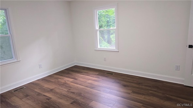 8057 Hermitage Rd, Henrico, VA 23228 - empty room featuring dark wood-type flooring and baseboards