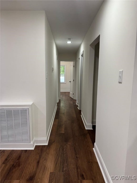 8057 Hermitage Rd, Henrico, VA 23228 - corridor with dark wood-type flooring and baseboards