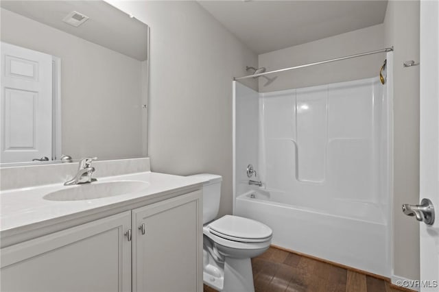 3391 Rock Creek Villa Dr, Quinton, VA 23141 - bathroom featuring vanity, wood finished floors, and washtub / shower combination