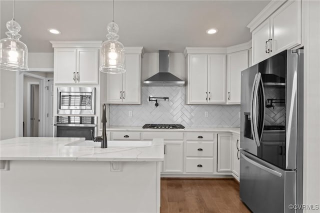 3391 Rock Creek Villa Dr, Quinton, VA 23141 - kitchen featuring appliances with stainless steel finishes, wall chimney range hood, white cabinets, dark wood finished floors, and backsplash
