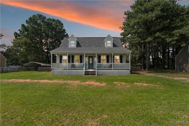 24716 Woodstream Ln, North Dinwiddie, VA 23803 - new england style home with covered porch, a carport, and roof with shingles