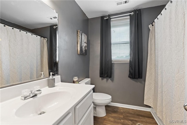 24716 Woodstream Ln, North Dinwiddie, VA 23803 - bathroom with vanity and wood finished floors
