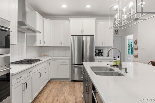 13518 Kelham Rd, Midlothian, VA 23113 - kitchen featuring stainless steel appliances, wall chimney exhaust hood, light countertops, white cabinets, and recessed lighting