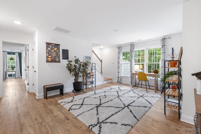 13518 Kelham Rd, Midlothian, VA 23113 - living area with stairs, plenty of natural light, wood finished floors, and recessed lighting