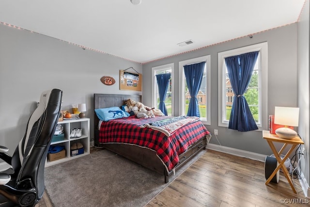 13518 Kelham Rd, Midlothian, VA 23113 - bedroom featuring multiple windows and wood-type flooring